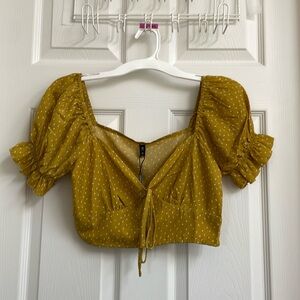Cute gold colored crop top with puff sleeves- Small US size 4
